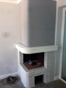 camino rivestito in pietra ricostruita mattone bianco primiceri