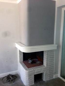 camino rivestito in pietra ricostruita mattone bianco primiceri