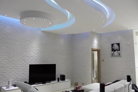 parete soggiorno con tv finta pietra, prezzo finti mattoni, mattoni antichizzati, soggiorno con mattoncini, mattoncini per salotto