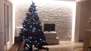 rivestimento finta pietra soggiorno roma, prezzo rivestimento, prezzo quarzite