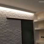 Una parete in listelli in soggiorno?